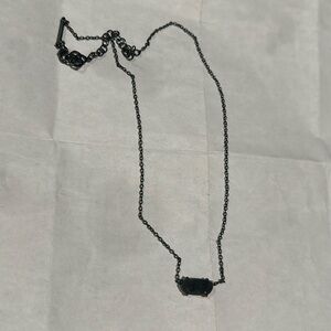 Kendra Scott necklace.